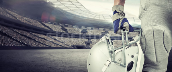 Composite image of close-up of american football player holding  Stock photo © wavebreak_media