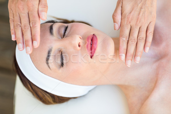 Calm woman receiving reiki treatment Stock photo © wavebreak_media