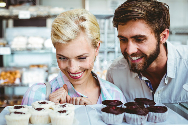 Cute couple on a date looking at cakes  Stock photo © wavebreak_media