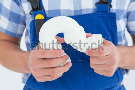 Mid section of handy man holding wrench Stock photo © wavebreak_media