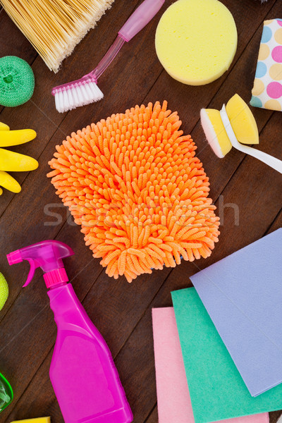 Various cleaning equipment arranged on wooden floor Stock photo © wavebreak_media