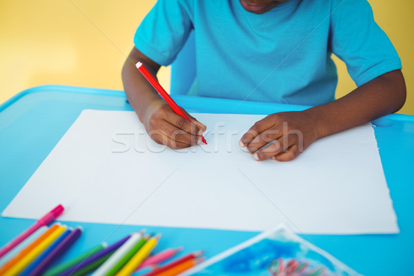 School kid drawing on a sheet Stock photo © wavebreak_media