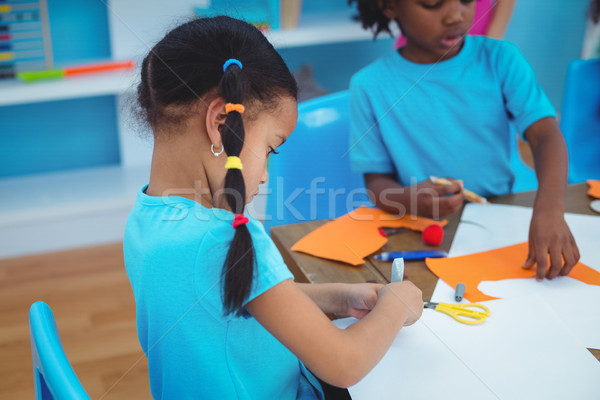 Happy kids enjoying arts and crafts painting Stock photo © wavebreak_media