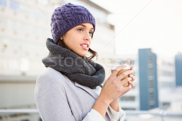 Smiling woman with take-away coffee Stock photo © wavebreak_media