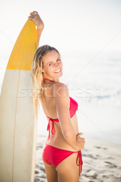 Mulher biquíni em pé prancha de surfe praia retrato Foto stock © wavebreak_media