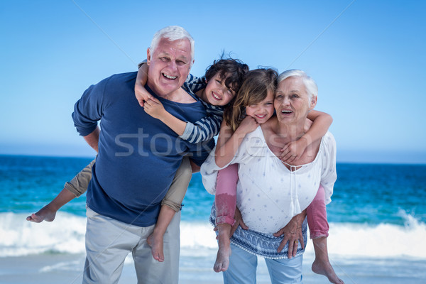 Heureux grands-parents Retour enfants plage [[stock_photo]] © wavebreak_media