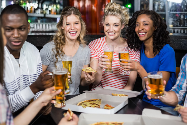 Gelukkig vrienden drinken pizza bar voedsel Stockfoto © wavebreak_media