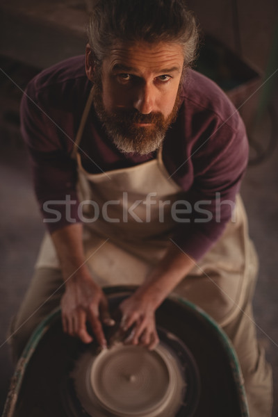 Portrait of male potter making a pot Stock photo © wavebreak_media