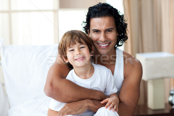 Caring father hugging his boy Stock photo © wavebreak_media