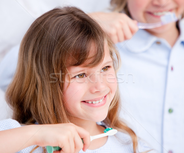 Caucasian child brushing his teeth  Stock photo © wavebreak_media