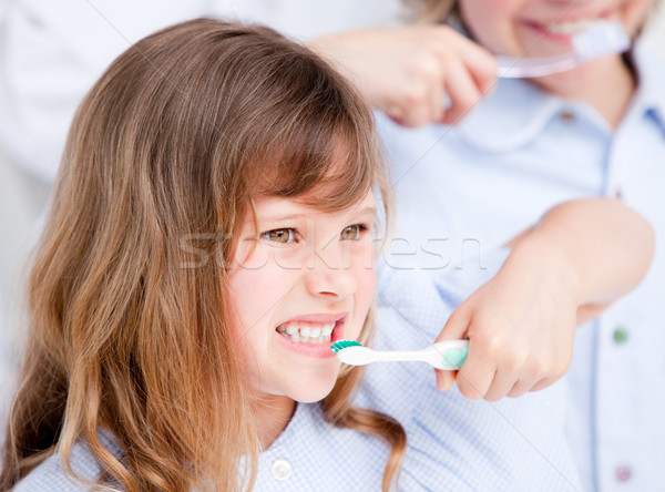 Girl brushing his teeth Stock photo © wavebreak_media
