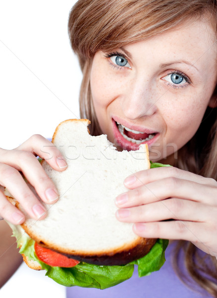 Rubio mujer comer sándwich aislado blanco Foto stock © wavebreak_media