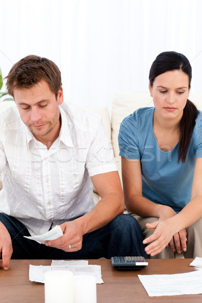 Désespérée couple regarder séance canapé [[stock_photo]] © wavebreak_media