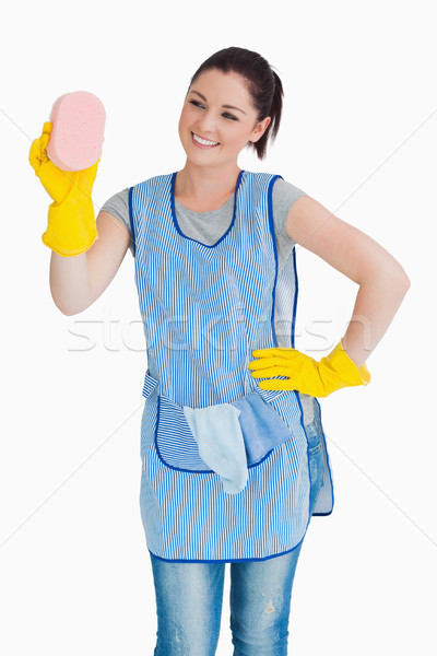 Cleaner woman washing with a sponge on the white background Stock photo © wavebreak_media