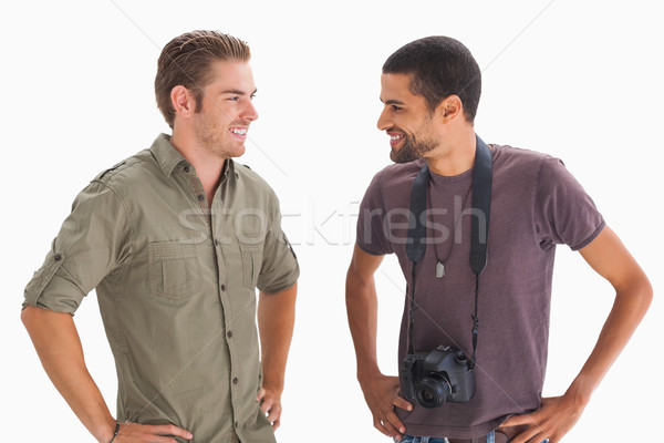 Elegante amigos sonriendo otro uno Foto stock © wavebreak_media