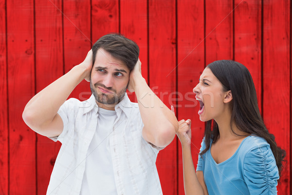 Composite image of angry brunette shouting at boyfriend Stock photo © wavebreak_media
