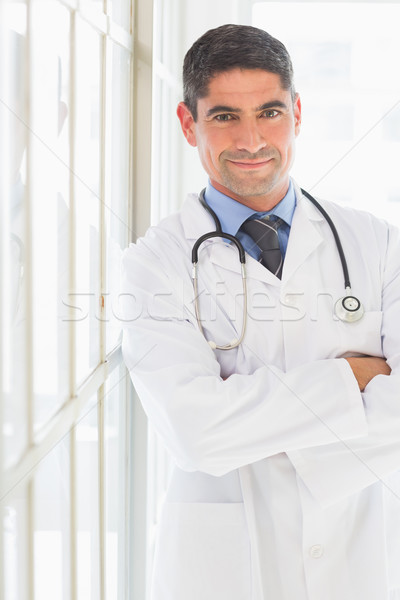 Doctor standing arms crossed Stock photo © wavebreak_media