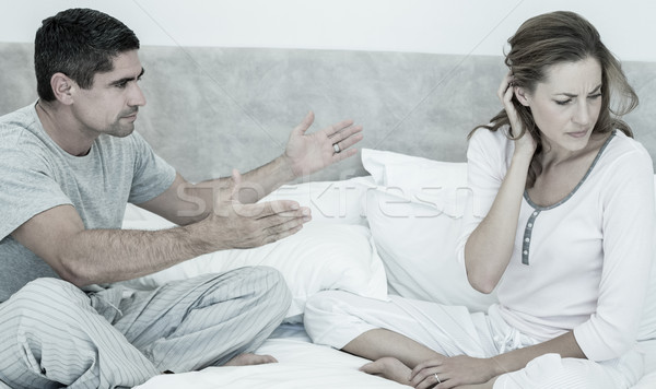 Conflicting couple in bed Stock photo © wavebreak_media