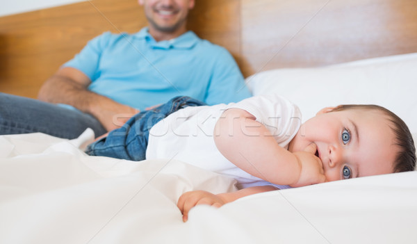 Cute baby with finger in mouth Stock photo © wavebreak_media
