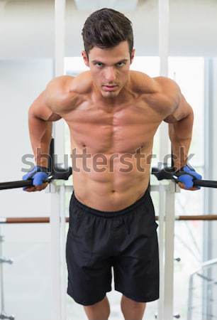 Shirtless male body builder doing pull ups Stock photo © wavebreak_media