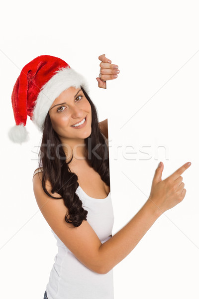 Woman pointing to large sign Stock photo © wavebreak_media