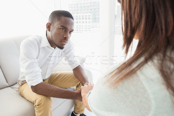 Therapist advising his listening patient Stock photo © wavebreak_media