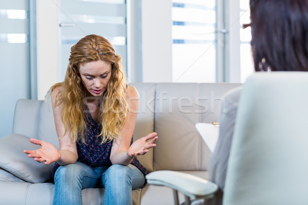 Psicologo parlando depresso paziente ufficio donna Foto d'archivio © wavebreak_media