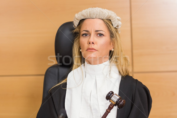 Stern judge sitting and listening Stock photo © wavebreak_media