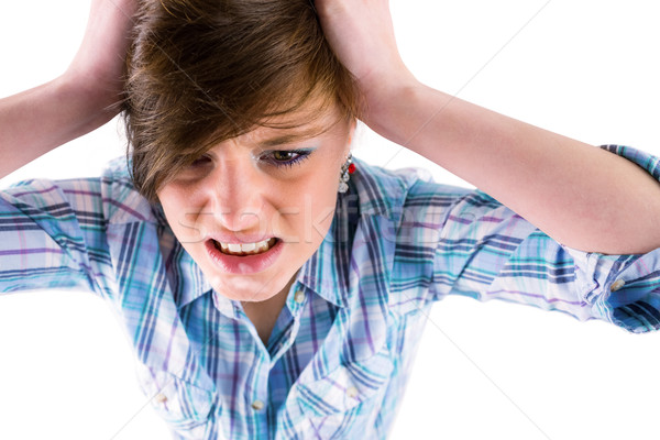 Angry pretty brunette with hands on head Stock photo © wavebreak_media