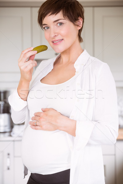 Zwangere vrouw eten jar augurken home keuken Stockfoto © wavebreak_media