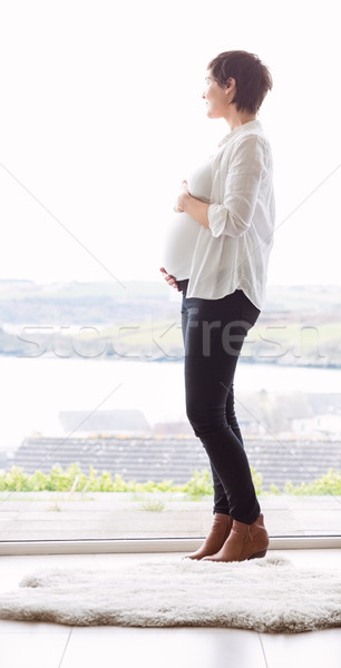 Stock fotó: Terhes · nő · tart · dudorodás · otthon · ház · ablak