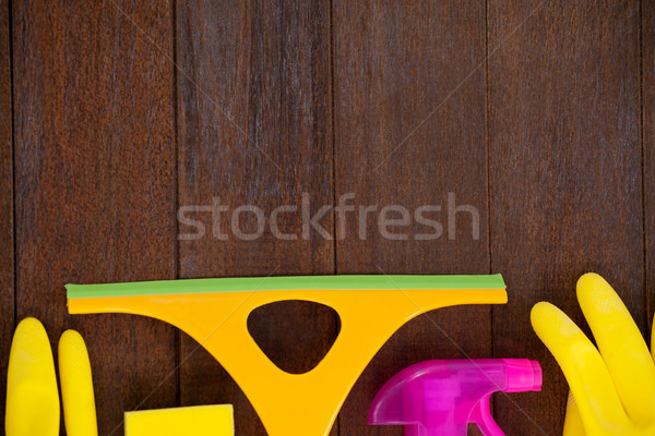 Cleaning equipment arranged on wooden floor Stock photo © wavebreak_media