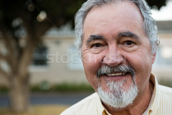 Boldog idős férfi közelkép portré fa Stock fotó © wavebreak_media