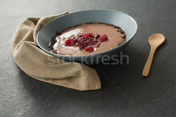 Sirop de chocolat fruits bol noir main Photo stock © wavebreak_media