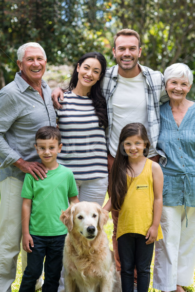 Happy family standing in a park Stock photo © wavebreak_media