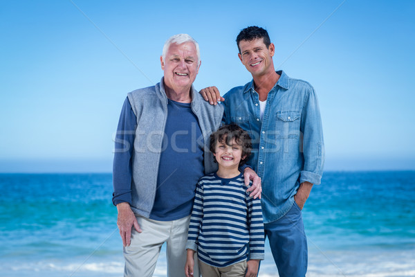 Masculina familia posando playa feliz Foto stock © wavebreak_media