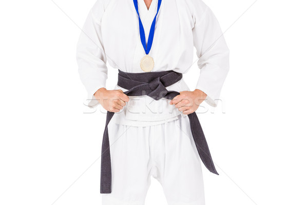Vechter poseren medaille rond nek witte Stockfoto © wavebreak_media