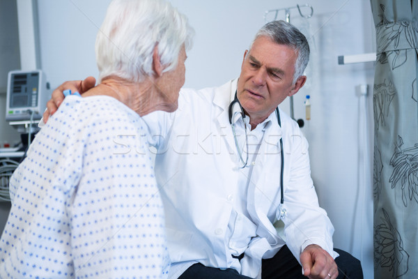 Doctor consoling senior patient Stock photo © wavebreak_media