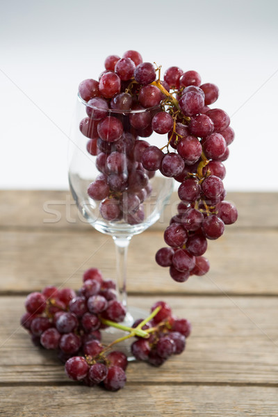 Bunch of red grapes in wine glass Stock photo © wavebreak_media