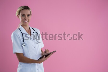 Sorridente enfermeira câncer de mama consciência comprimido Foto stock © wavebreak_media