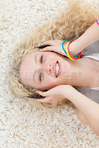 Foto stock: Menina · adolescente · ouvir · música · piso · estudante · educação · adolescente