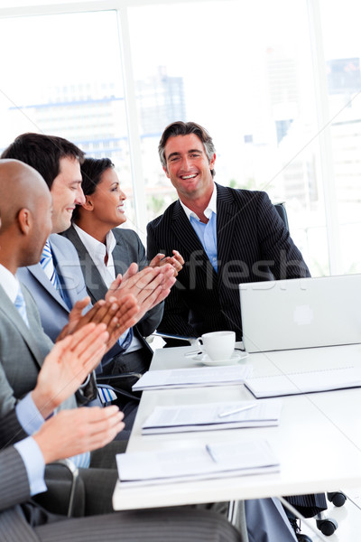 Csapat sikeres üzletemberek tapsol megbeszélés számítógép Stock fotó © wavebreak_media
