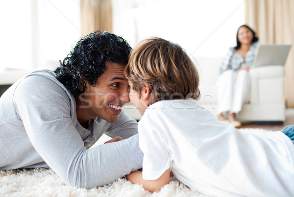 Jolly father and his son armwrestling  Stock photo © wavebreak_media