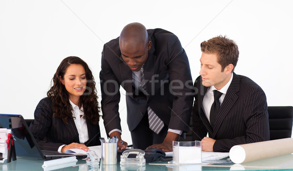 Stock photo: African businessman talking to his team