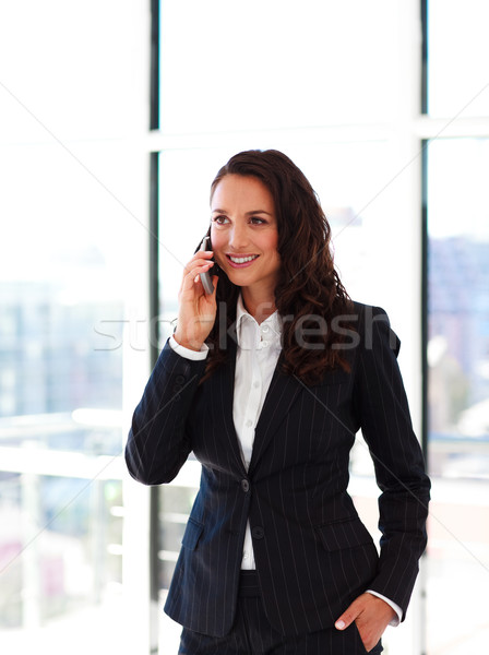 Smiling businesswoman talking on phone Stock photo © wavebreak_media