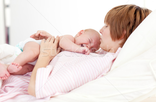 Woman holding her newborn baby Stock photo © wavebreak_media