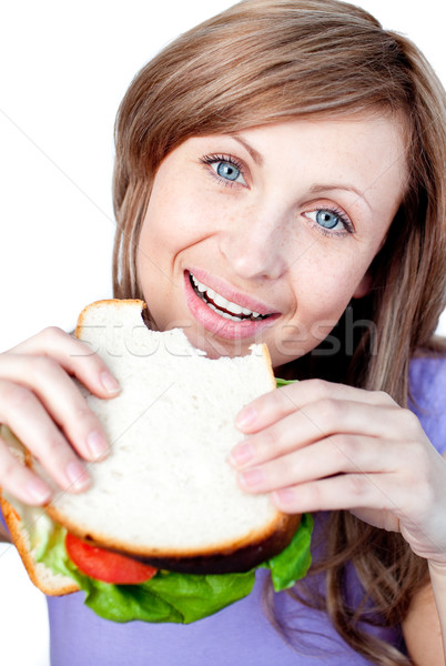 Feliz mujer comer sándwich aislado blanco Foto stock © wavebreak_media