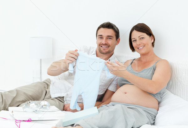 Jonge ouders kleding home glimlach gelukkig Stockfoto © wavebreak_media