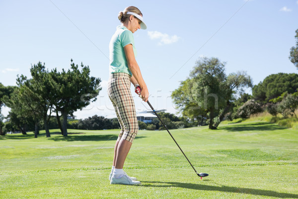 Female golfer taking a shot Stock photo © wavebreak_media