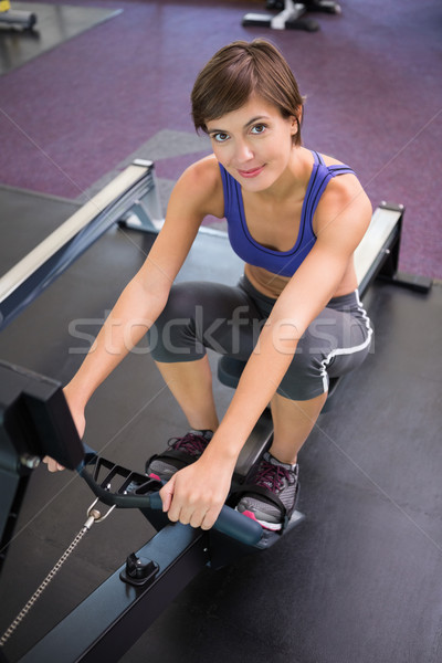 Foto stock: Encajar · sonriendo · morena · remo · máquina